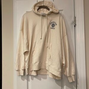 women’s sweatshirt with dolman sleeves. It runs big so medium ladies can fit it